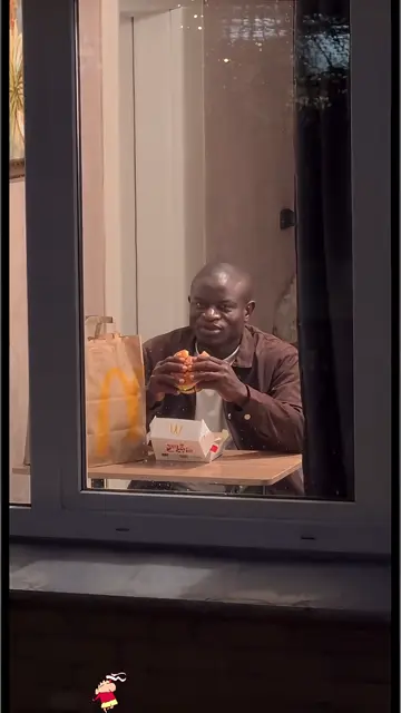 Mid-bite, then the long stare
